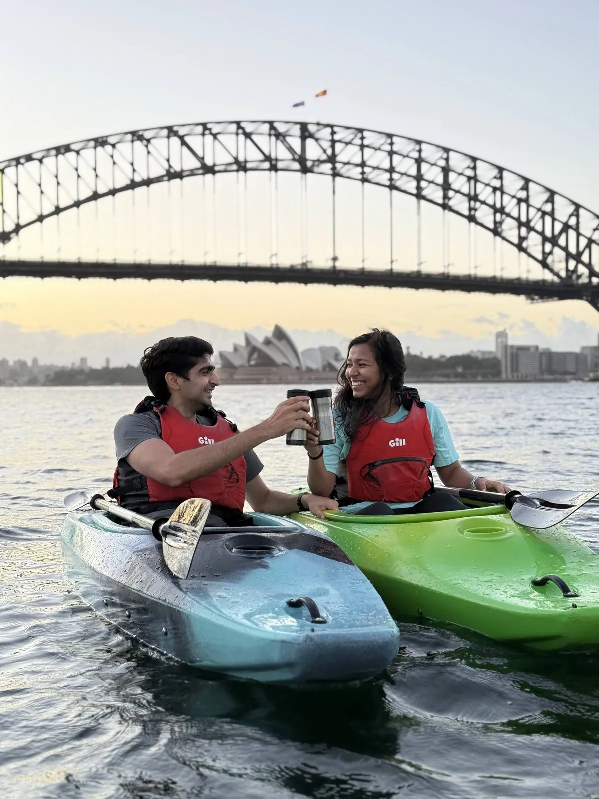 WealthyWithTwo couple kayaking in Australia, building wealth together